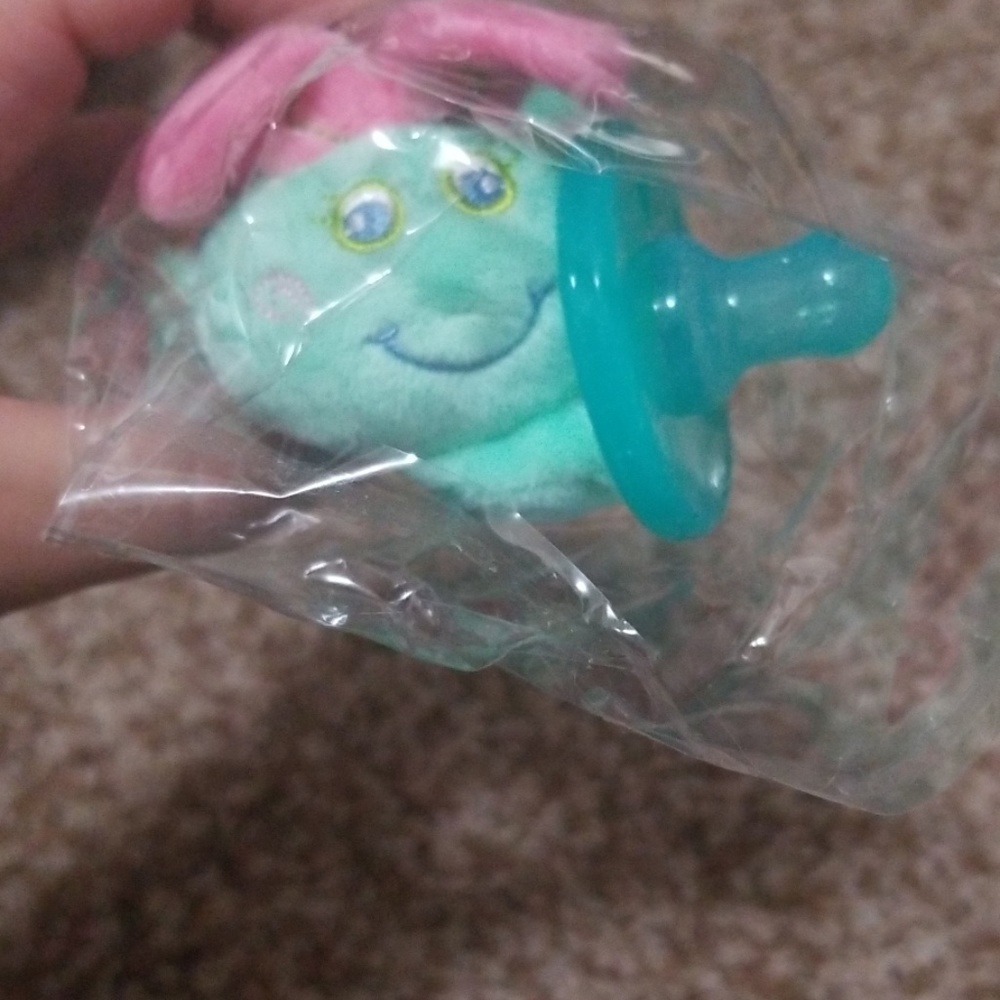 Soft jelly pascifiers/ critter attached